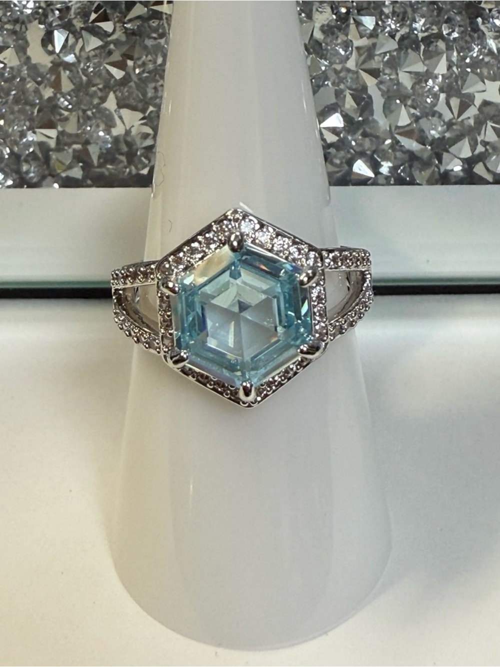 Let’s hear it for the sparkle BP ring.  Aquamarine CZ on Rhodium. Size 8